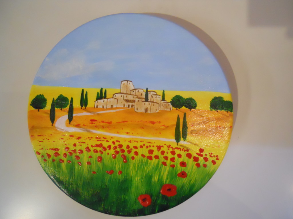 Paesaggio toscano e papaveri